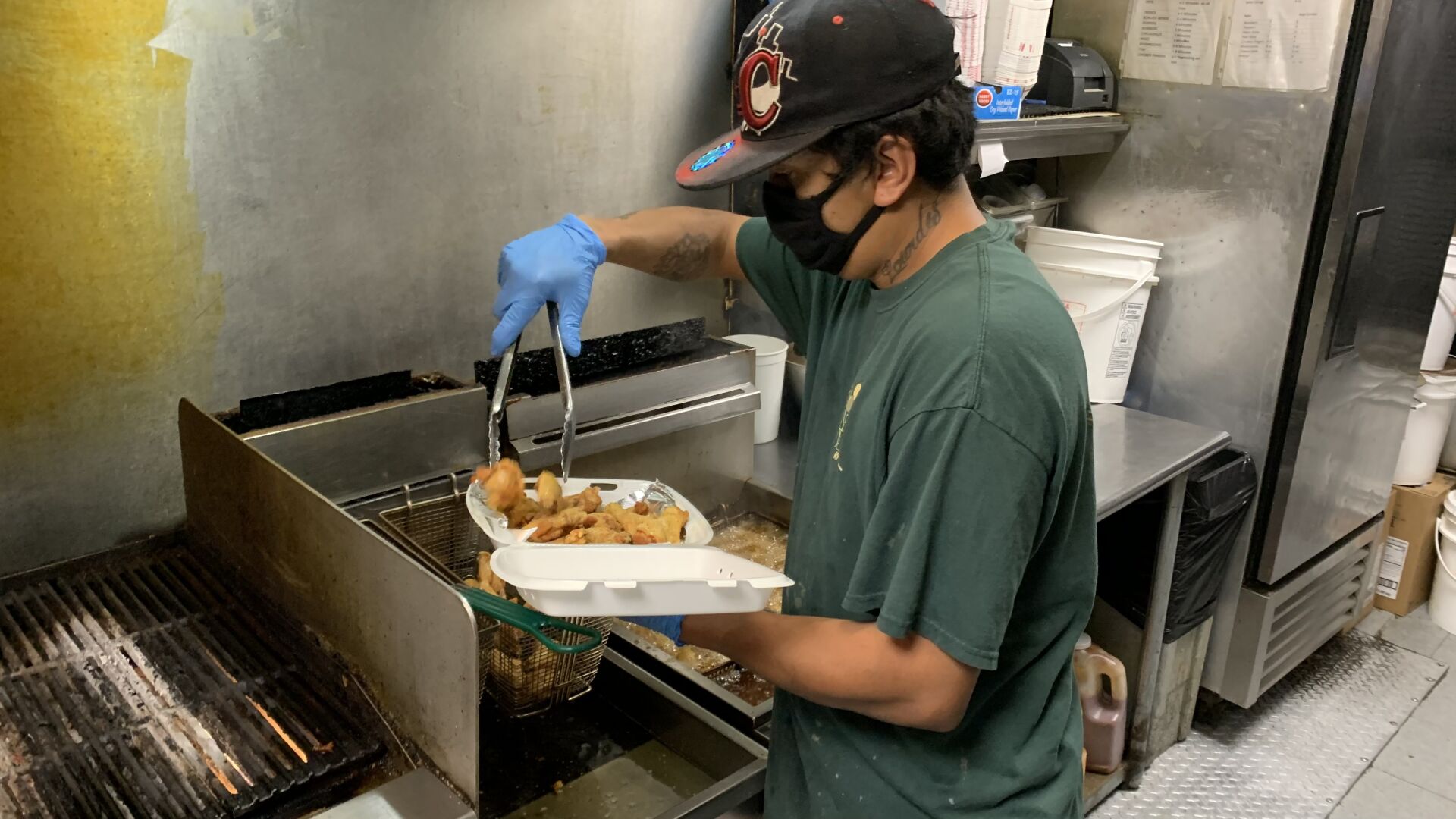 Plan to lift Kentucky's pandemic restrictions sparks protest, mixed feelings from businesses